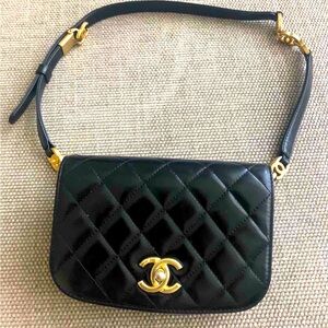 Chanel Quilted Lambskin Waistbag in Black.